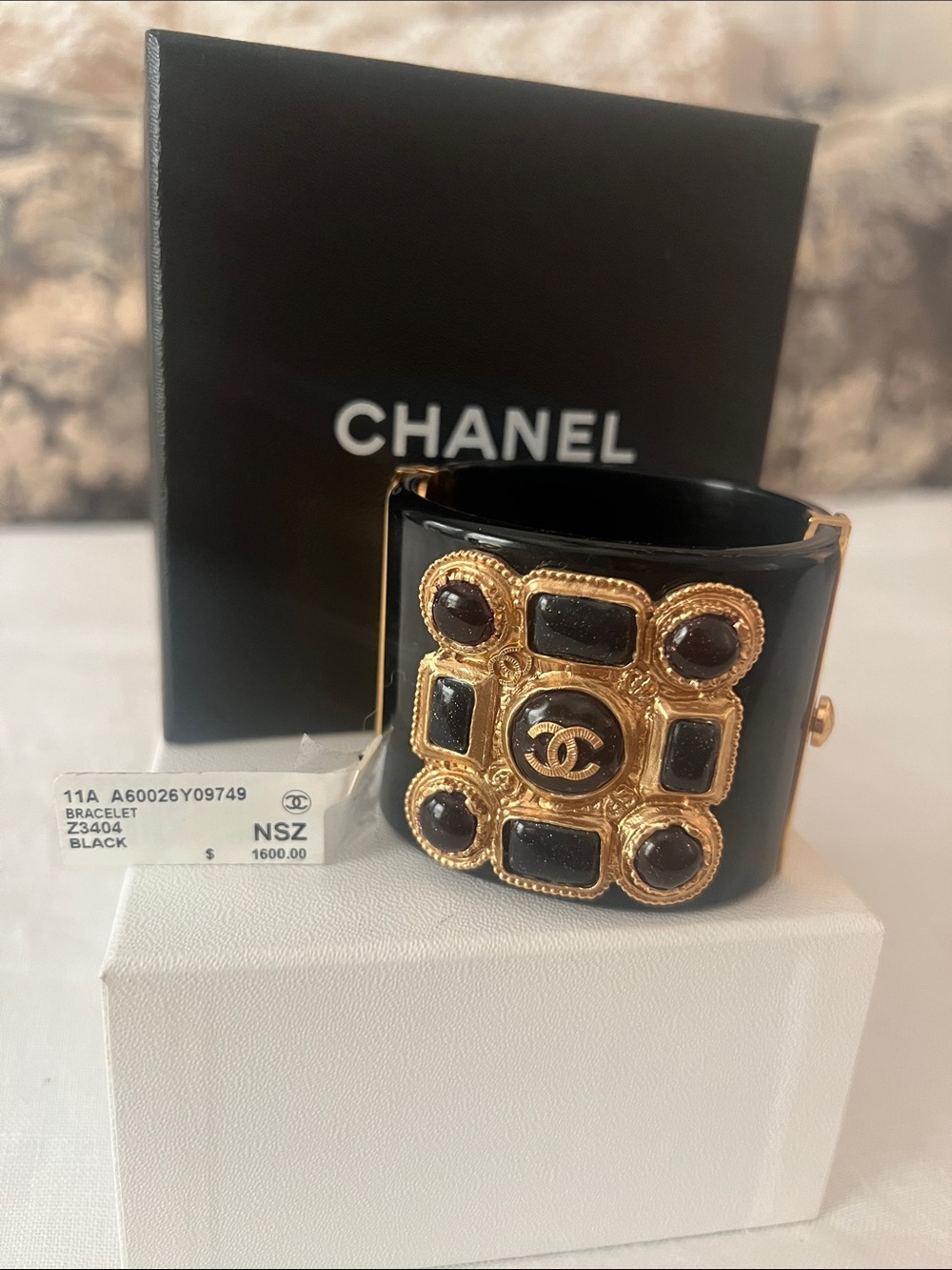 CHANEL 2011 Karl Lagerfield era Black Resin Cuff Bracelet with Gold CC Medallion